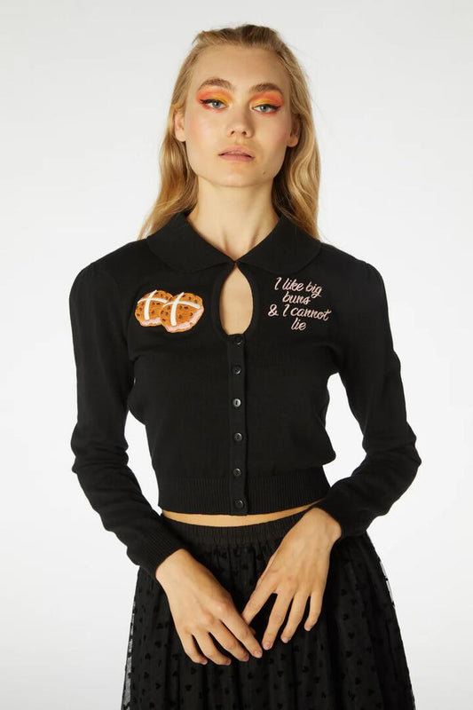 Image of a model wearing Outerwear. Productname: I Like Big Buns Cardigan in Black colour by brand - Revival