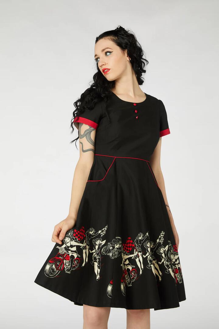 Image of a model wearing Dress. Productname: Cruisin For A Bruisin Dress in Black colour by brand - Revival
