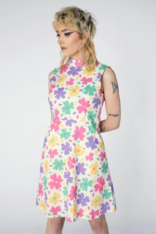 Image of a model wearing Dress. Productname: Floral Sleeveless Mini Dress in Black colour by brand - Revival