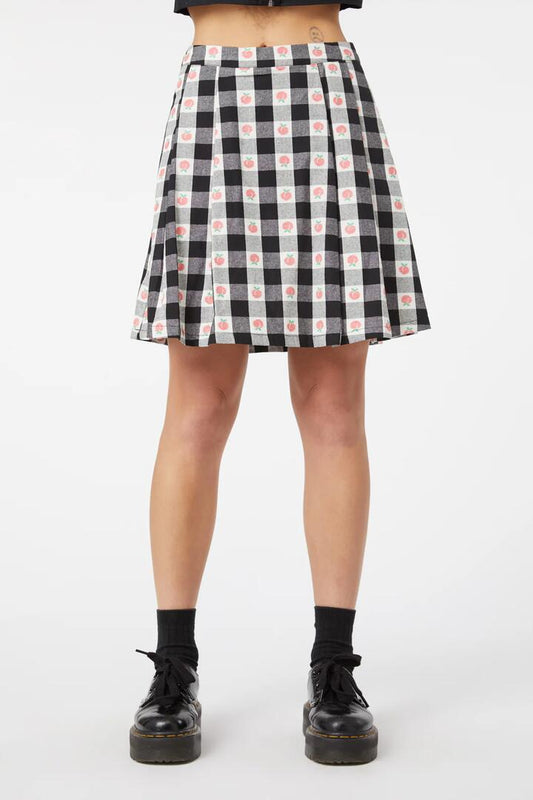 Image of a model wearing Skirts. Productname: Gingham Peach Mini Skirt in Black/White colour by brand - Revival