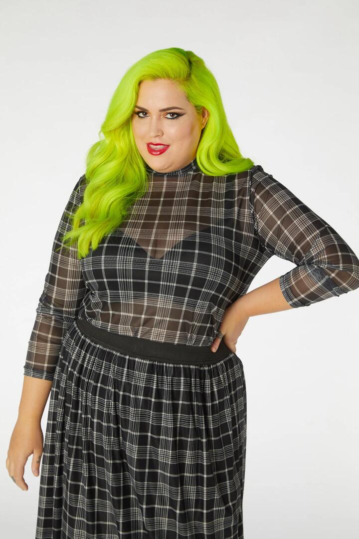 Image of a model wearing Tops. Productname: Double Trouble Mesh Top Curve in Black colour by brand - Dangerfield