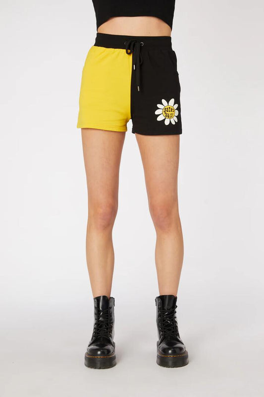 Image of a model wearing Outerwear. Productname: Daisy Cotton Sweat Short in Black/Yellow colour by brand - Dangerfield