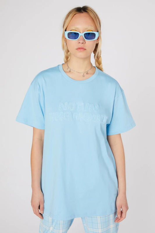 Image of a model wearing Tops. Productname: Mood Oversized Jersey Tee in Blue colour by brand - Dangerfield