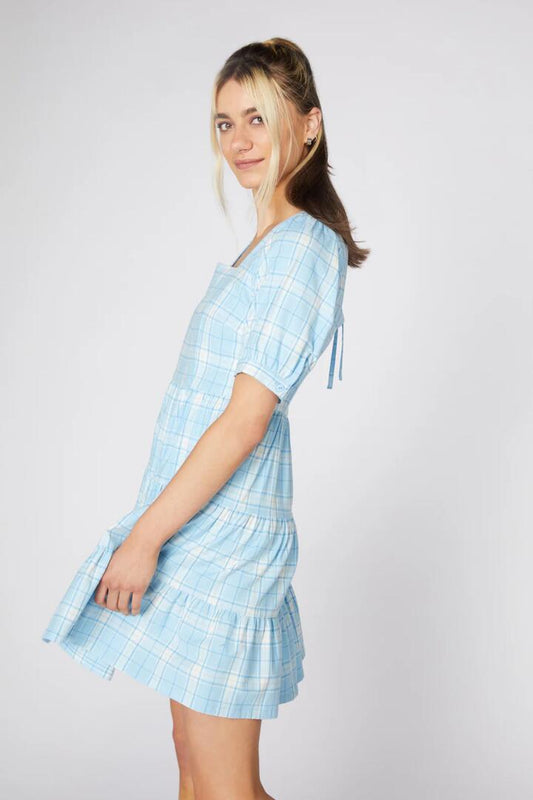 Image of a model wearing Dress. Productname: Tartan Mood Ruffle Dress in Blue colour by brand - Dangerfield