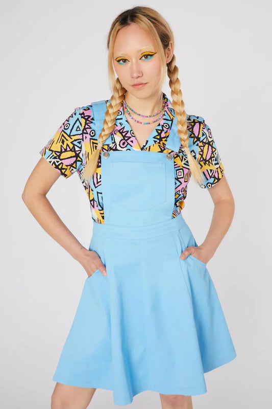 Image of a model wearing Dress. Productname: Ace Bib & Brace Drill Pinny in Blue colour by brand - Dangerfield