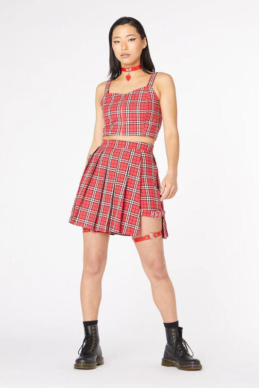 Image of a model wearing Skirts. Productname: Nah Tartan Buckle Skort in Red colour by brand - Dangerfield