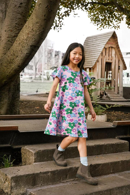Image of a model wearing Dress. Productname: Starry Flower Kids Jersey Dress in Pink colour by brand - Princess Highway Kids