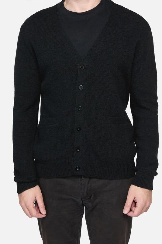 Image of a model wearing Outerwear. Productname: Pistolero Cardi in Black colour by brand - Revival