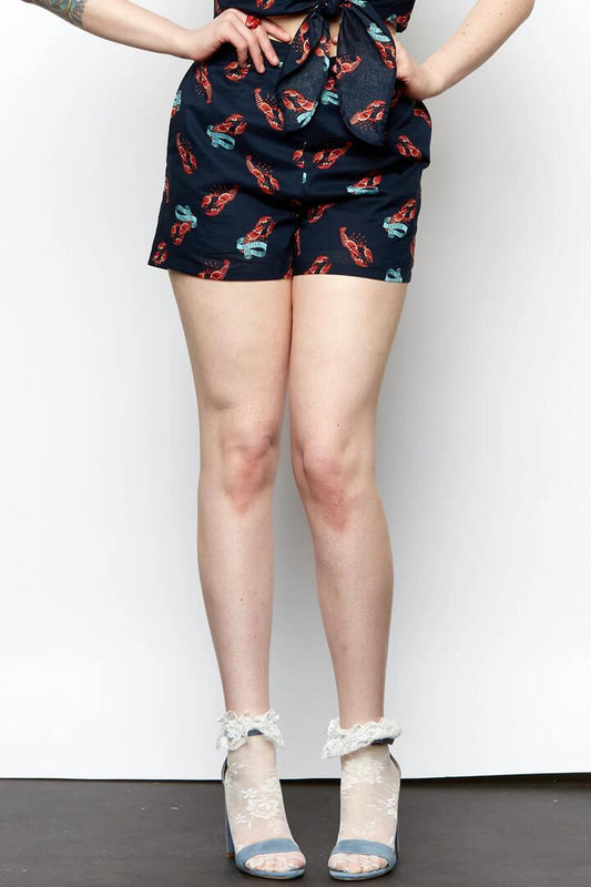 Image of a model wearing Shorts. Productname: Catch Of The Day Short in Midnight colour by brand - Revival