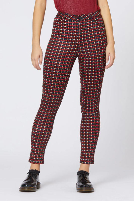 Image of a model wearing Pants. Productname: Zesty Pant in Red colour by brand - Revival