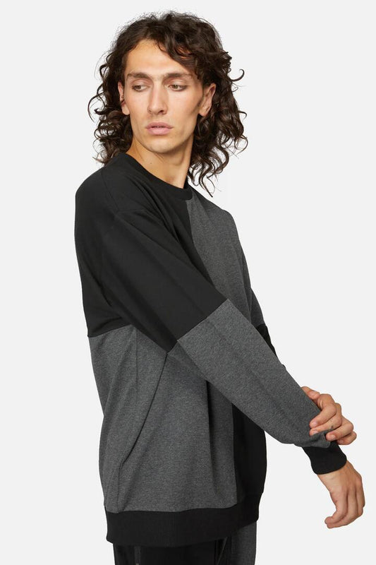 Image of a model wearing Outerwear. Productname: Drew Split Boxy Sweater in Black/Grey colour by brand - Dangerfield