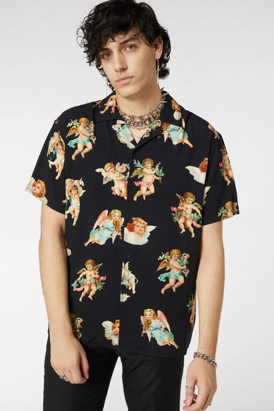 Image of a model wearing Tops. Productname: Cherub Viscose Print Shirt in Black colour by brand - Dangerfield