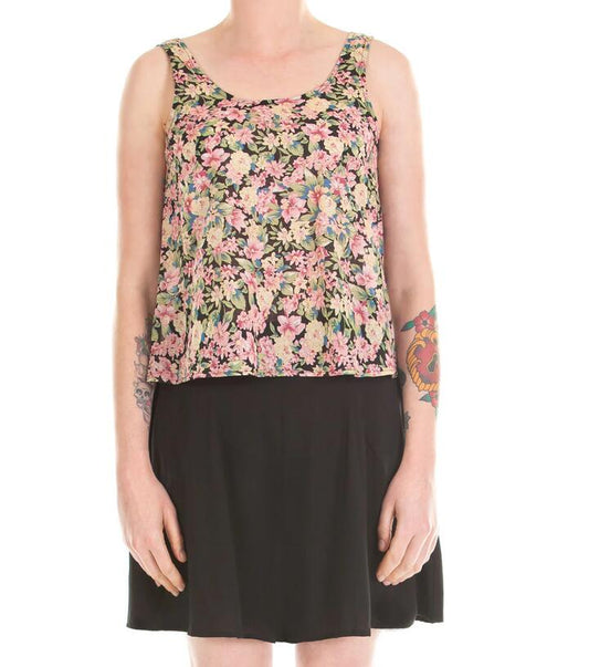 Image of a model wearing Tops. Productname: Rita Floral Swing Top in Black colour by brand - Dangerfield