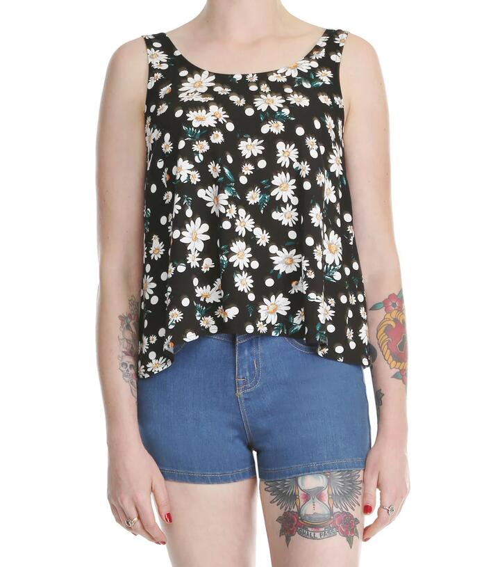 Image of a model wearing Tops. Productname: Dotted Daisy Top in Black colour by brand - Dangerfield