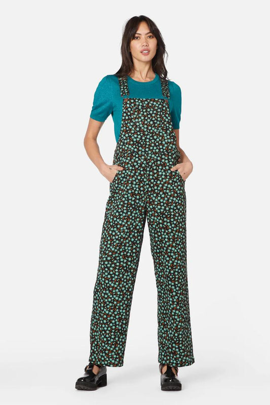 Image of a model wearing Pants. Productname: Elsa Ditsy Overall in Black colour by brand - Princess Highway