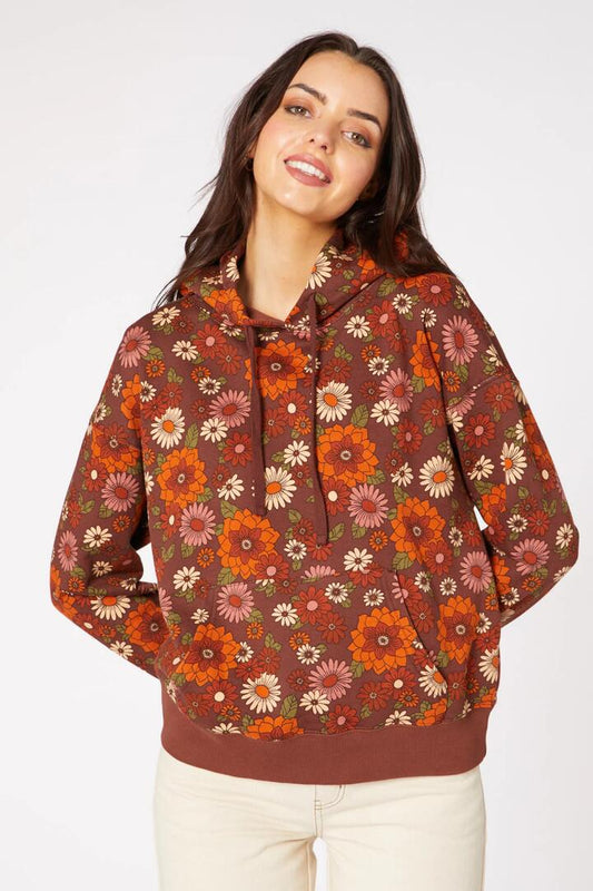 Image of a model wearing Outerwear. Productname: Lindy70S Floral Track Hoodie in Chocolate colour by brand - Princess Highway