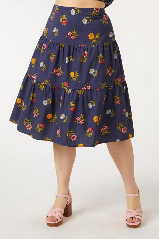 Image of a model wearing Skirts. Productname: Mietta Skirt in Navy colour by brand - Princess Highway