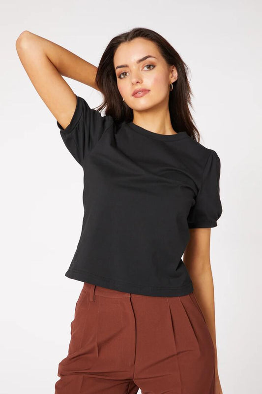 Image of a model wearing Tops. Productname: Mabel Tee in Black colour by brand - Princess Highway