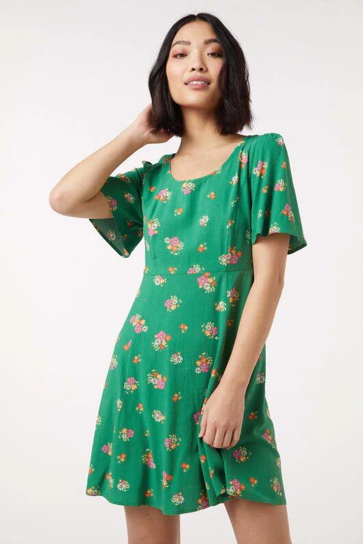 Image of a model wearing Dress. Productname: Ziva Floral Mini Dress in Green colour by brand - Princess Highway
