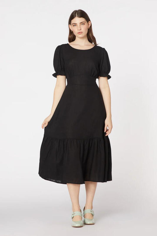 Image of a model wearing Dress. Productname: Enid Midi Dress in Black colour by brand - Princess Highway