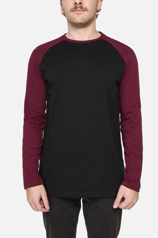 Image of a model wearing Tops. Productname: Meredith LS Top in Maroon colour by brand - Dangerfield