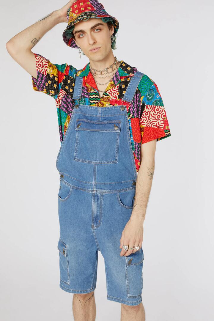 Image of a model wearing Denim. Productname: Aggro Denim Short Overall in Indigo colour by brand - Dangerfield
