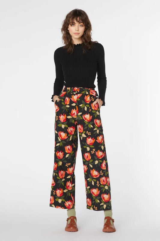 Image of a model wearing Pants. Productname: King Protea Pant in Black colour by brand - Princess Highway