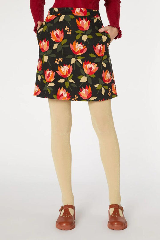 Image of a model wearing Skirts. Productname: King Protea Skirt in Black colour by brand - Princess Highway