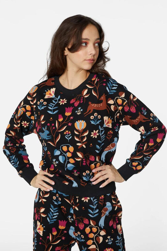 Image of a model wearing Outerwear. Productname: Folksy Karina Fleece Sweater in Black colour by brand - Princess Highway