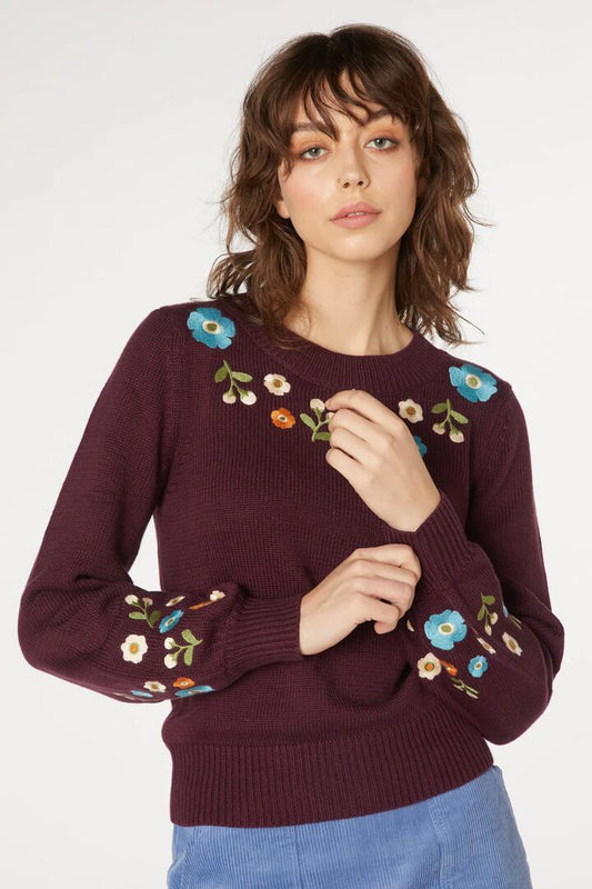 Image of a model wearing Outerwear. Productname: Ingrid Embroidered Sweater in Plum colour by brand - Princess Highway