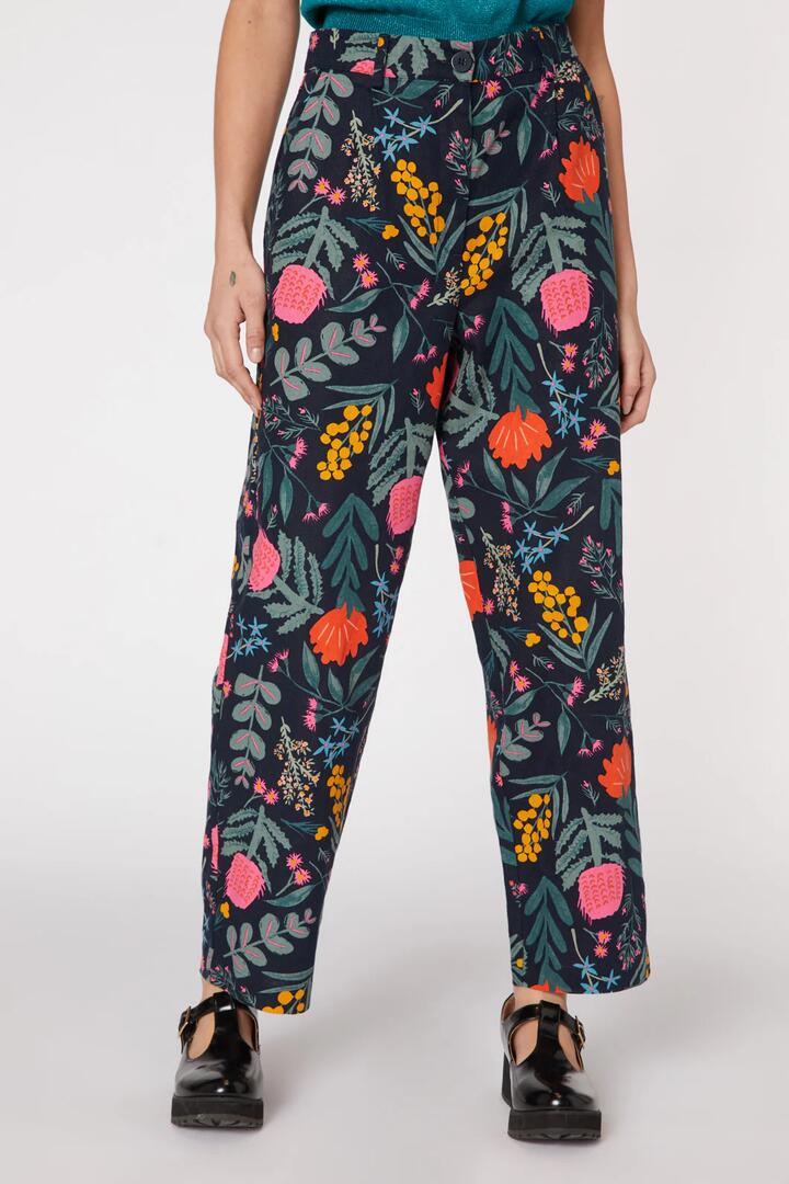 Image of a model wearing Pants. Productname: Eva Native Pant in Navy colour by brand - Princess Highway