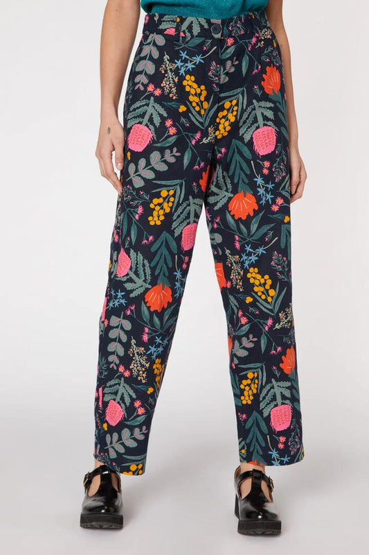 Image of a model wearing Pants. Productname: Eva Native Pant in Navy colour by brand - Princess Highway