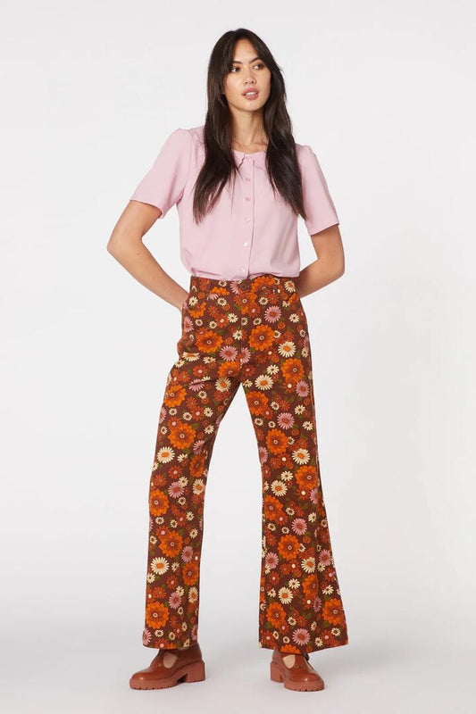 Image of a model wearing Denim. Productname: Lindy 70S Flare Jean in Chocolate colour by brand - Princess Highway