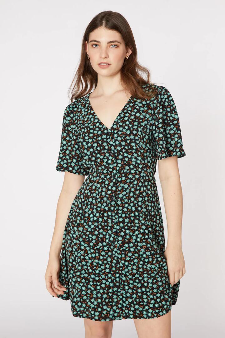 Image of a model wearing Dress. Productname: Elsa Ditsy Mini Dress in Black colour by brand - Princess Highway