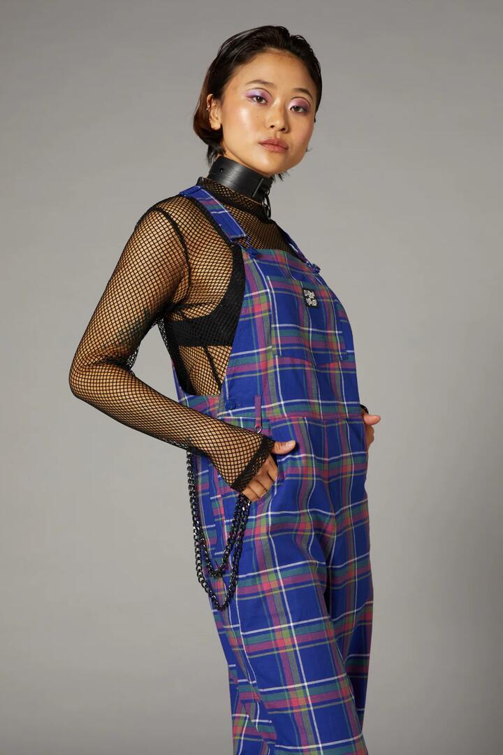 Image of a model wearing Pants. Product name - Werewolf Tartan Goth Overalls in Multi colour by brand - Black Friday
