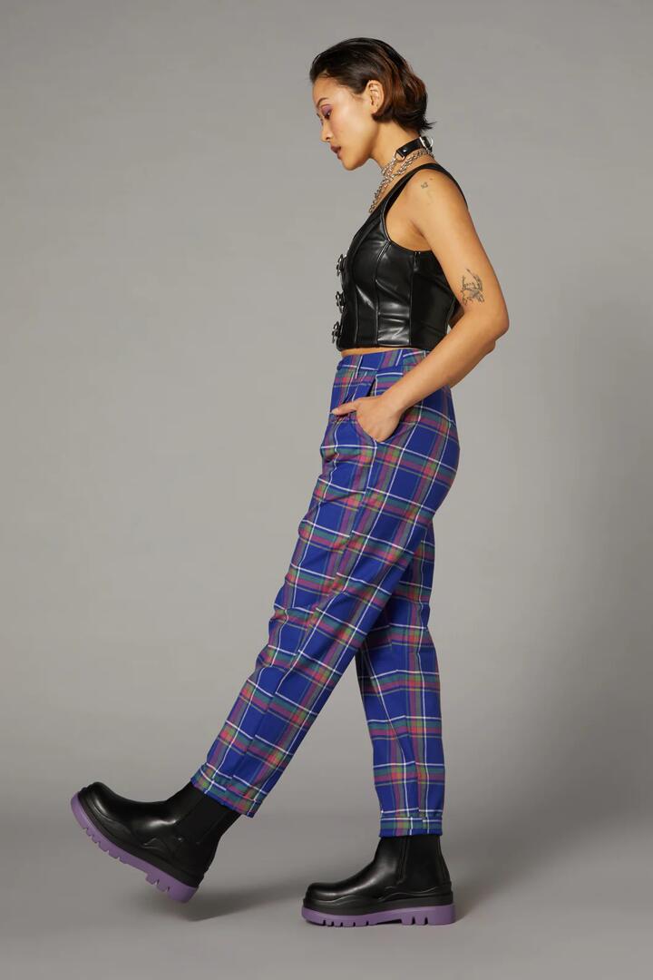 Image of a model wearing Pants. Product name - Werewolf Tartan Goth Pant in Multi colour by brand - Black Friday