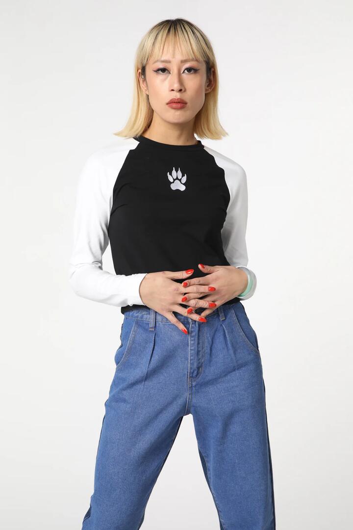 Image of a model wearing Tops. Productname: Paw Embroidered Top in Black/White colour by brand - Black Friday