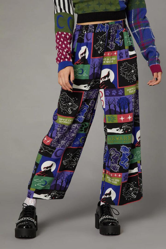 Image of a model wearing Pants. Productname: Wolf Pack Print Pant in Multi colour by brand - Black Friday