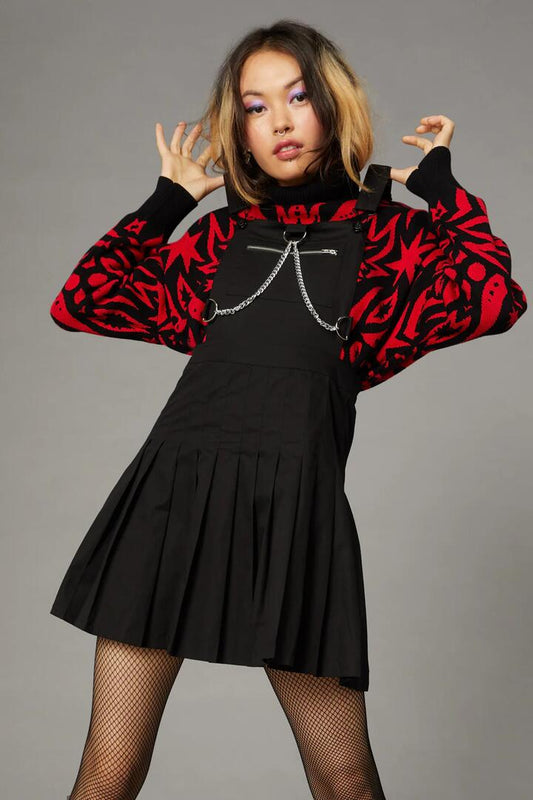 Image of a model wearing Dress. Productname: Punk Trim Pinafore in Black colour by brand - Black Friday