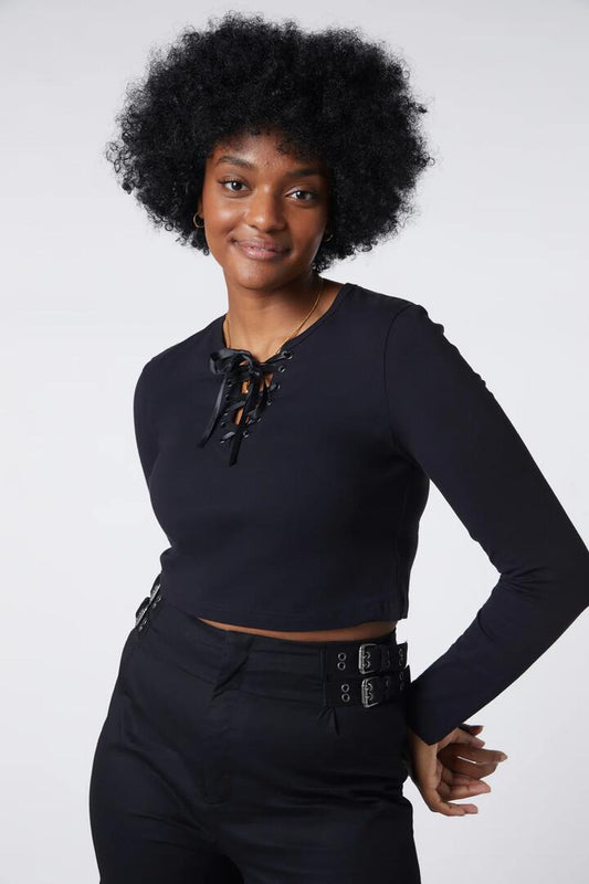 Image of a model wearing Tops. Productname: Lace Up Top in Black colour by brand - Black Friday
