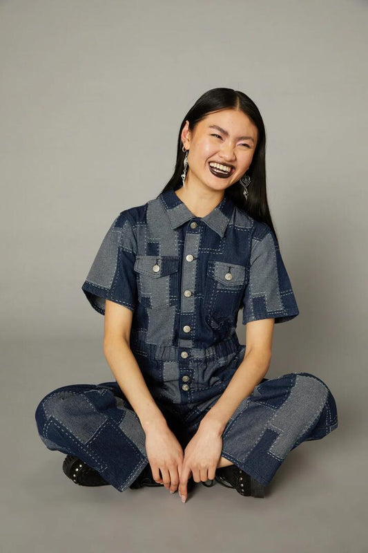 Image of a model wearing Denim. Productname: Patchwork Denim Boilersuit in Indigo colour by brand - Black Friday
