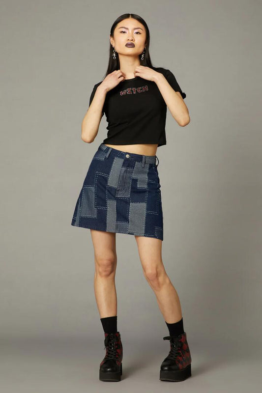 Image of a model wearing Denim. Productname: Patchwork Denim Skirt in Indigo colour by brand - Black Friday