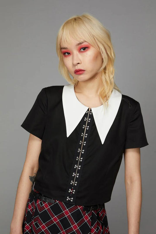 Image of a model wearing Tops. Productname: Wednesday Hook Blouse in Black colour by brand - Black Friday
