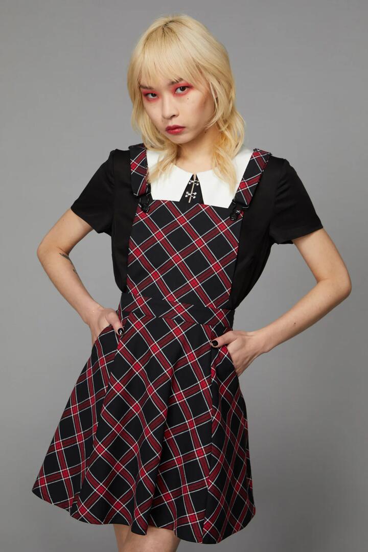 Image of a model wearing Dress. Productname: Batty Goth Tartan Pinafore in Red/Black colour by brand - Black Friday