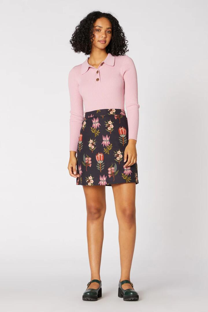 Image of a model wearing Skirts. Productname: Tessa Native Skirt in Navy colour by brand - Princess Highway