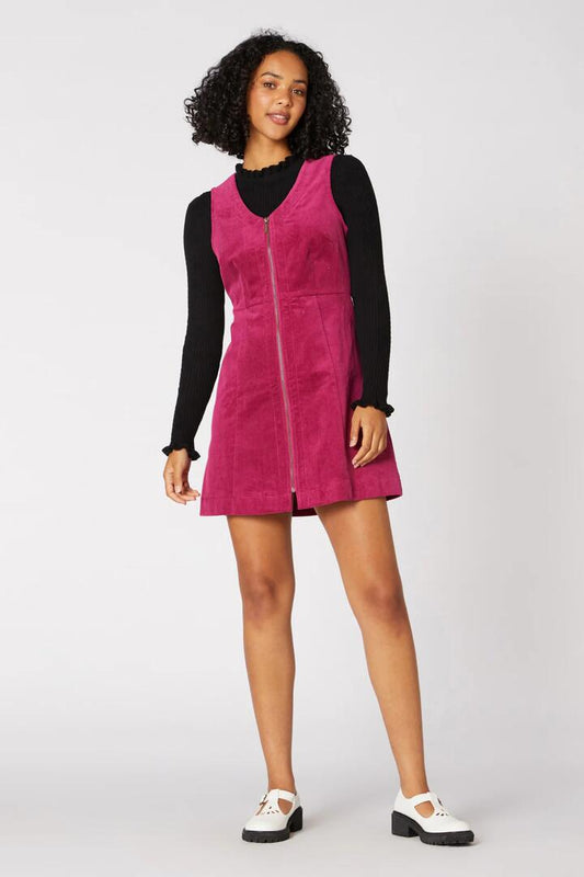 Image of a model wearing Dress. Productname: Honey Cord Pinny in Black colour by brand - Princess Highway