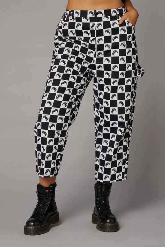 Image of a model wearing Pants. Productname: Bat Check Print GothPant in Black/White colour by brand - Black Friday