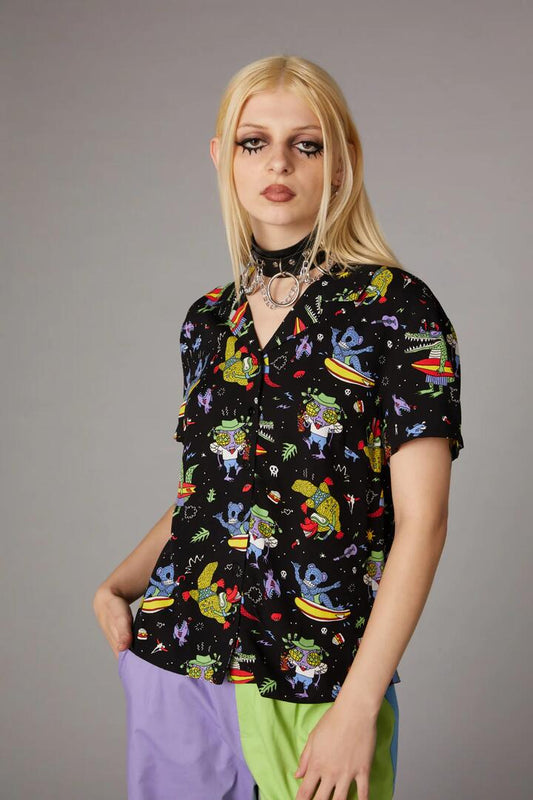 Image of a model wearing Tops. Productname: Surfing Creatures Print Blouse in Black colour by brand - Black Friday