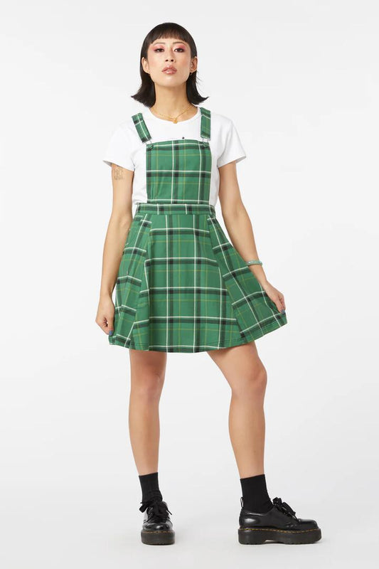 Image of a model wearing Dress. Productname: Forest Tartan Pinafore in Green colour by brand - Black Friday