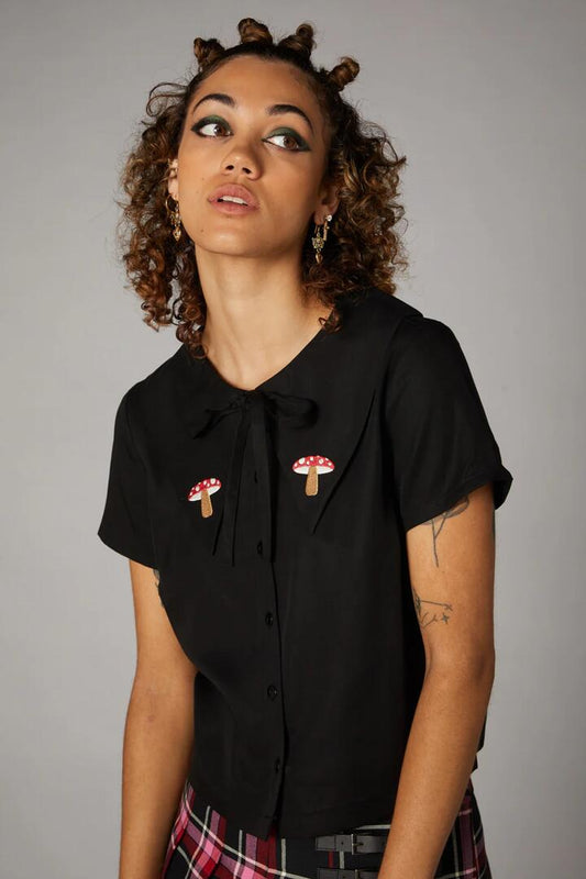 Image of a model wearing Tops. Productname: Toadstool Collar Blouse in Black colour by brand - Black Friday